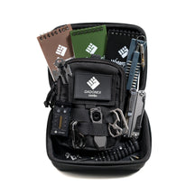 OMNI Field EDC Combo packed in an open case with pouch, tools and notebooks